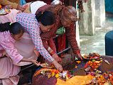 Kathmandu Valley 1 Budhanikantha 5 Pilgrims Making Offerings At Sleeping Vishnu The Hindu pilgrims are allowed to enter Budhanilkantha Narayan (Sleeping Vishnu) after the priests are finished and make offering and touch Vishnus feet.